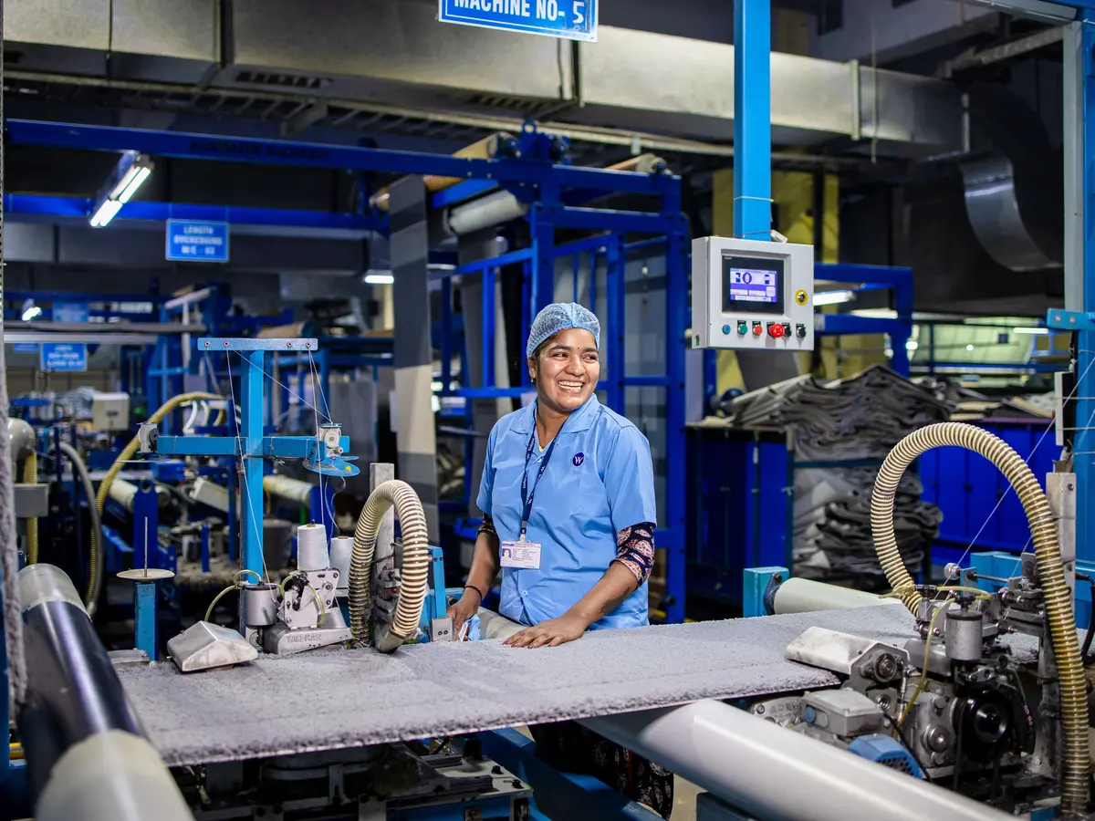 Industrial maintenance technician inspecting facility equipment