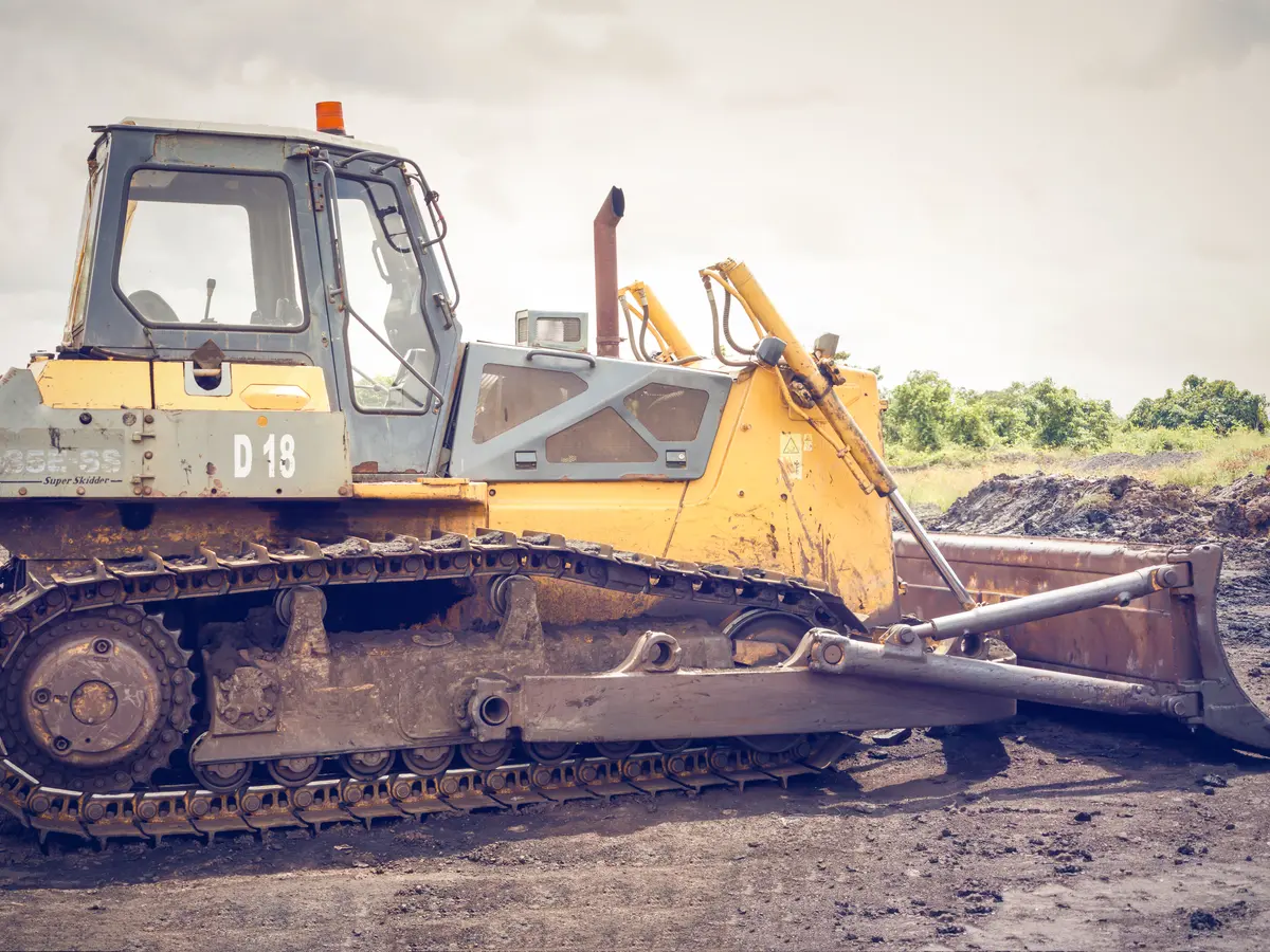 Heavy earthmoving equipment operating on a construction project
