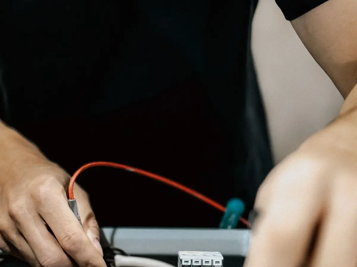 Industrial electrician carrying out electrical systems work
